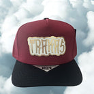 gorra trakas guinda